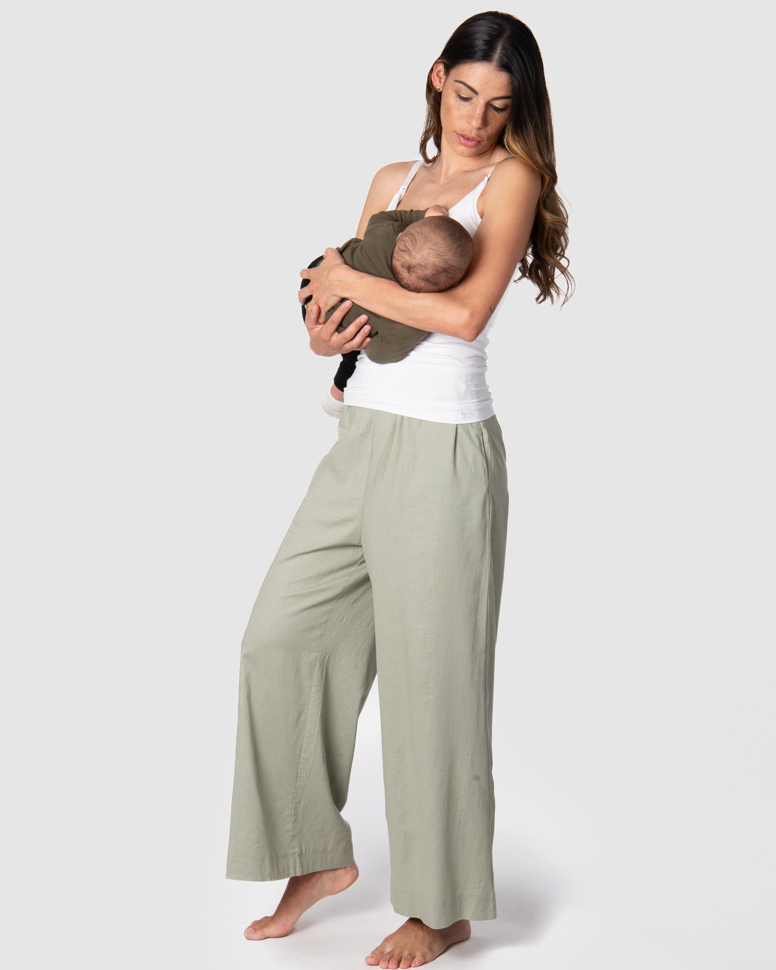 Kami, a mother of 2, loves the comfort of the new Hotmilk &#39;Sage Lounge Pant,&#39; paired with the Hotmilk My Necessity nursing cami, creating the ultimate postpartum lounge set. These pants are the embodiment of sumptuous comfort, featuring a soft waistband and a flattering 7/8 length that combines style and relaxation seamlessly. Discover the perfect loungewear for pregnancy breastfeeding and postpartum comfort with Hotmilk&#39;s Sage Lounge Pant